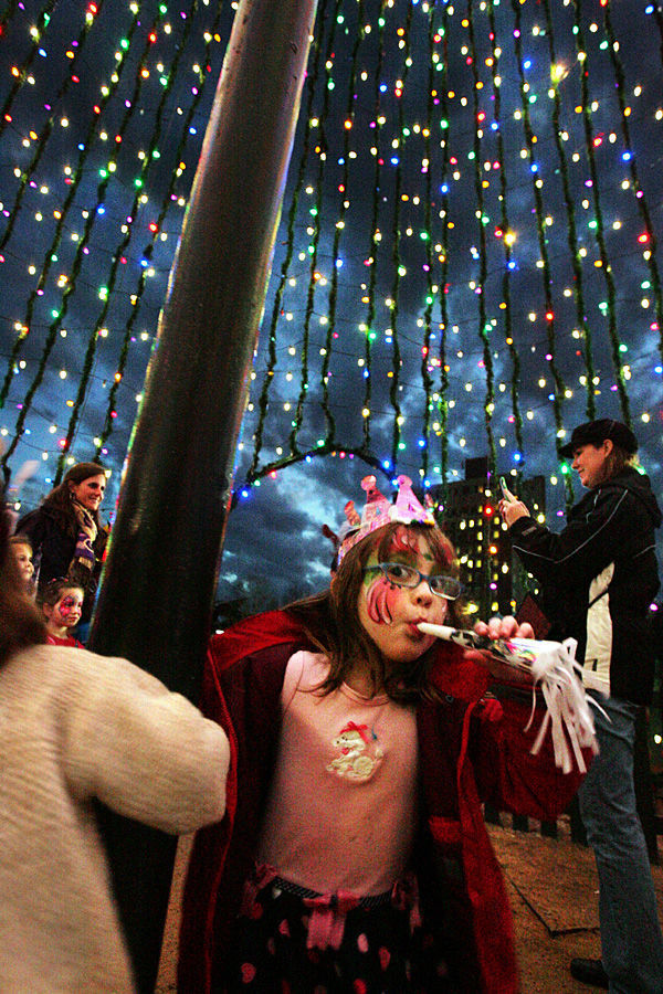 NYE tree at Marion Square girl inside Wade Spees